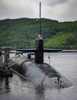 The Ohio-class ballistic-missile submarine USS Rhode Island (SSBN 740) is docked at Her Majesty's Naval Base, Clyde, United Kingdom, July 4, 2022.