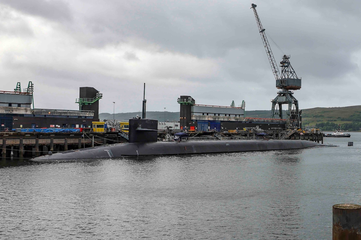 The Ohio-class ballistic-missile submarine USS Rhode Island (SSBN 740) is docked at Her Majesty's Naval Base, Clyde, United Kingdom, July 4, 2022.