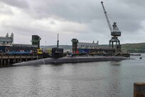 The Ohio-class ballistic-missile submarine USS Rhode Island (SSBN 740) is docked at Her Majesty's Naval Base, Clyde, United Kingdom, July 4, 2022.