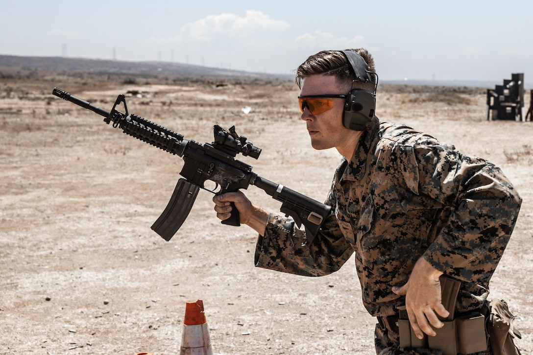 U.S. Marine Corps Cpl. Anthony D. Pio, a videographer with Headquarters and Service Battalion, Marine Corps Recruit Depot San Diego, runs through a drill during an advanced marksmanship training course at Edson Range, Camp Pendleton, California, June 27, 2022. AMT is designed to give Marines a more practical understanding of their service issued weapons.