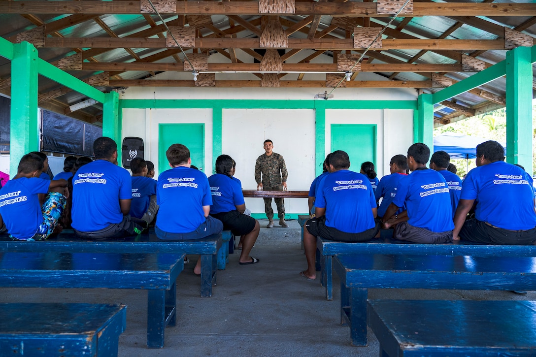 U.S. Marine Corps Lance Cpl. Francisco Pallanes Aleho, a landing support specialist with Task Force Koa Moana 22, I Marine Expeditionary Force, describes his career in the Marine Corps to the children participating in the Division of Juvenile Justice’s Omesuub Ngosisechakl Emesmechokl Law Enforcement Explorers Program in Ngeremlengui, Republic of Palau, June 20, 2022. Omesuub Ngosisechakl Emesmechokl in the native language translates to learning, teaching and discipline, traits that are exemplified by the Marines and Sailors strengthening U.S. partnerships through subject matter expert exchanges. Named “Koa Moana,” after a Hawaiian/Polynesian phrase meaning “ocean warrior,” the task force fosters peace and security, builds relationships, and supports an international rules-based order that benefits the Indo-Pacific region.