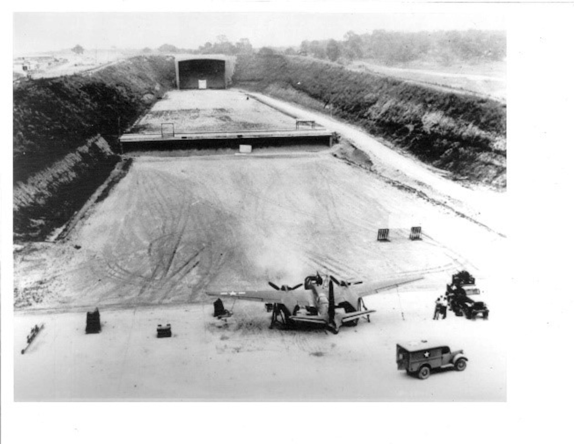 This historic photo shows one of the ranges at what is now known as the Aerospace Vehicle Survivability Facility (AVSF). The AVSF is responsible for developing and executing aircraft Title 10 Live Fire Test and Evaluation programs as well as research, development, test and evaluation in addition to high-fidelity modeling and simulation of aerospace vehicle combat survivability to evaluate and enhance system performance to current and future weapon systems under operationally-realistic conditions. The AVSF is operated by the Aerospace Survivability and Safety Office at Wright-Patterson Air Force Base, Ohio. This office is part of the 704th Test Group at Holloman Air Force Base, New Mexico. The 704 TG is a unit of the Arnold Engineering Development Complex headquartered at Arnold Air Force Base, Tennessee. (Courtesy photo)