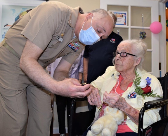 WWII Navy Nurse Corps officer and Bremerton resident feted on 102nd Birthday

One hundred and two years young...Anna Marie Cole, former Navy Nurse Corps officer who served during World War Two, received a few surprise visitors - and many well-wishes - on her birthday, July 1, 2022, as Capt. Patrick Fitzpatrick, Naval Hospital Bremerton director and Navy Medicine Readiness Training Command Bremerton commanding officer, and Capt. Shawn Kase, Chief Nursing Officer, both current Navy Nurse Corps officers, presented her with a letter of commendation citing her “exceptional service to the United States Navy Nurse Corps during the Second World War" (Official Navy photo by Douglas H Stutz, NHB/NMRTC Bremerton public affairs officer).