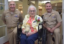 WWII Navy Nurse Corps officer and Bremerton resident feted on 102nd Birthday

One hundred and two years young...Anna Marie Cole, former Navy Nurse Corps officer who served during World War Two, received a few surprise visitors - and many well-wishes - on her birthday, July 1, 2022, as Capt. Patrick Fitzpatrick, Naval Hospital Bremerton director and Navy Medicine Readiness Training Command Bremerton commanding officer, and Capt. Shawn Kase, Chief Nursing Officer, both current Navy Nurse Corps officers, presented her with a letter of commendation citing her “exceptional service to the United States Navy Nurse Corps during the Second World War" (Official Navy photo by Douglas H Stutz, NHB/NMRTC Bremerton public affairs officer).