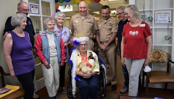 WWII Navy Nurse Corps officer and Bremerton resident feted on 102nd Birthday

One hundred and two years young...Anna Marie Cole, former Navy Nurse Corps officer who served during World War Two, received a few surprise visitors - and many well-wishes - on her birthday, July 1, 2022, as Capt. Patrick Fitzpatrick, Naval Hospital Bremerton director and Navy Medicine Readiness Training Command Bremerton commanding officer, and Capt. Shawn Kase, Chief Nursing Officer, both current Navy Nurse Corps officers, presented her with a letter of commendation citing her “exceptional service to the United States Navy Nurse Corps during the Second World War" (Official Navy photo by Douglas H Stutz, NHB/NMRTC Bremerton public affairs officer).