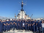Members of the Coast Guard’s Office of Safety and Environmental Health presents the crew of the Coast Guard Cutter Resolute with the 2021 Excellence in Afloat Safety Award, June 7, 2022.