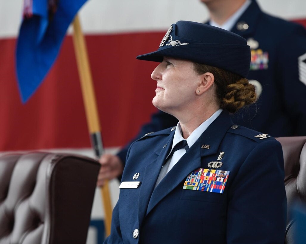 Col. Michelle Schnakenberg, the incoming 28th Medical Group commander, listens as a speech is given during a change of command ceremony at Ellsworth Air Force Base, S.D., July 06, 2022.