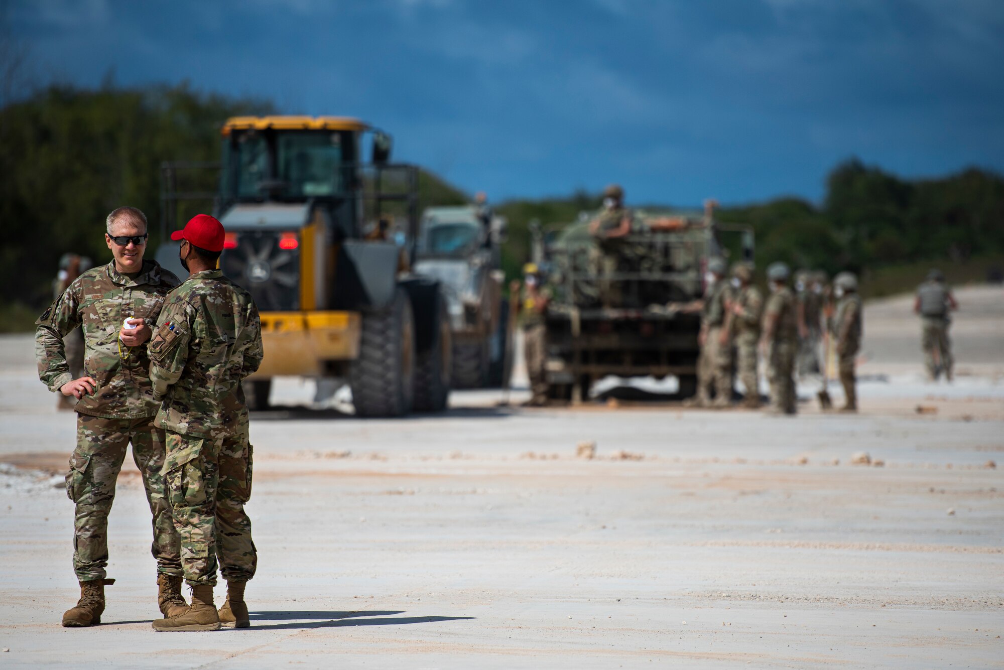 U.S. Air Force Brig. Gen. Paul Birch, 36th Wing commander, talks with a member assigned to the 36th Contingency Response Squadron during an immersion tour at Northwest Field Andersen Air Force Base, Guam, June 23, 2022. Birch visited different units on base and learned about how squadrons contribute to the Andersen mission. (U.S. Air Force photo by Staff Sgt. Suzie Plotnikov)