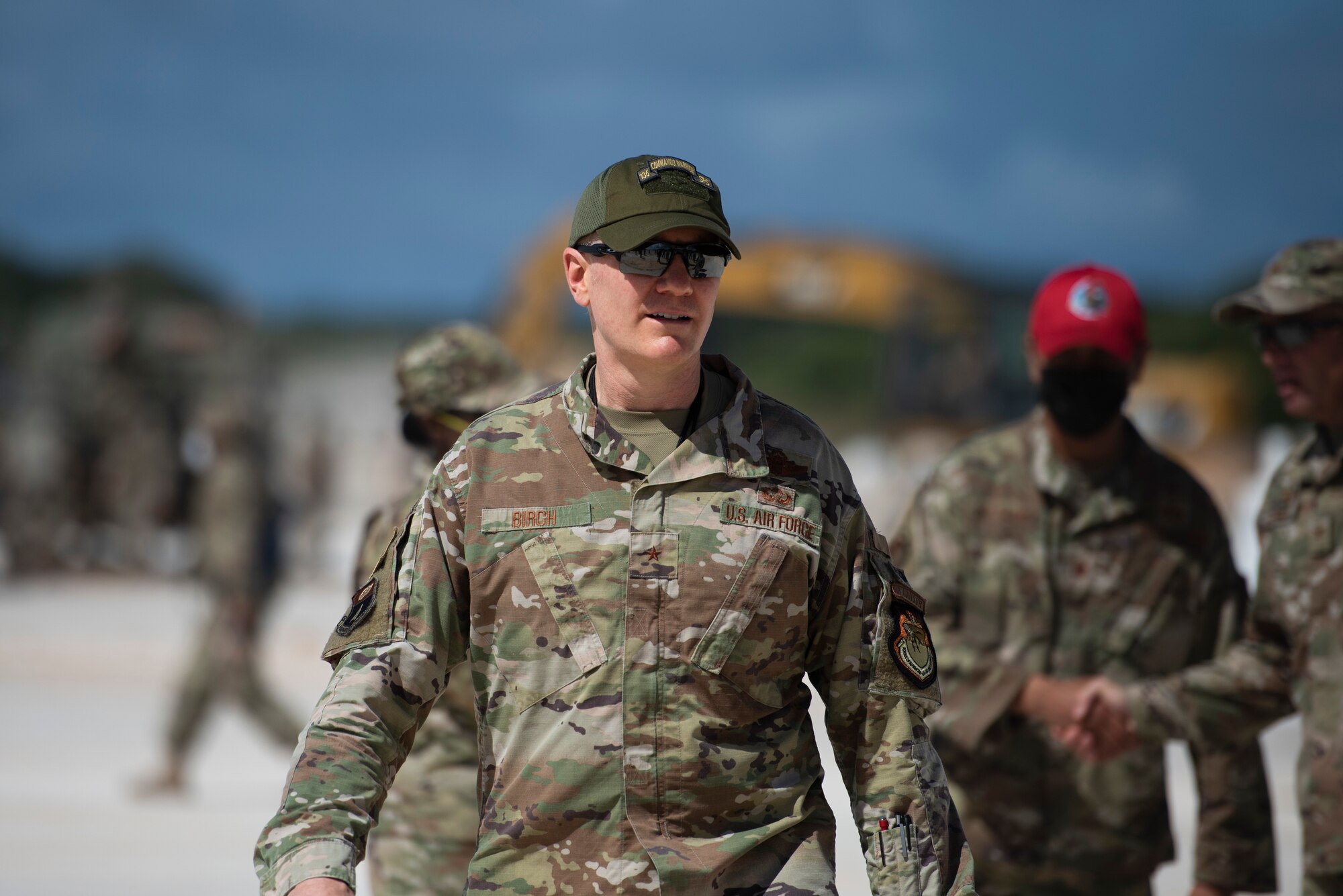 U.S. Air Force Brig. Gen. Paul Birch, 36th Wing commander, observes 554th Rapid Engineer Deployable Heavy Operational Repair Squadron Engineers Airmen complete rapid airfield damage repair training during an immersion tour at Northwest Field Andersen Air Force Base, Guam, June 23, 2022. Birch visited different units on base and learned about how squadrons contribute to the Andersen mission. (U.S. Air Force photo by Staff Sgt. Suzie Plotnikov)