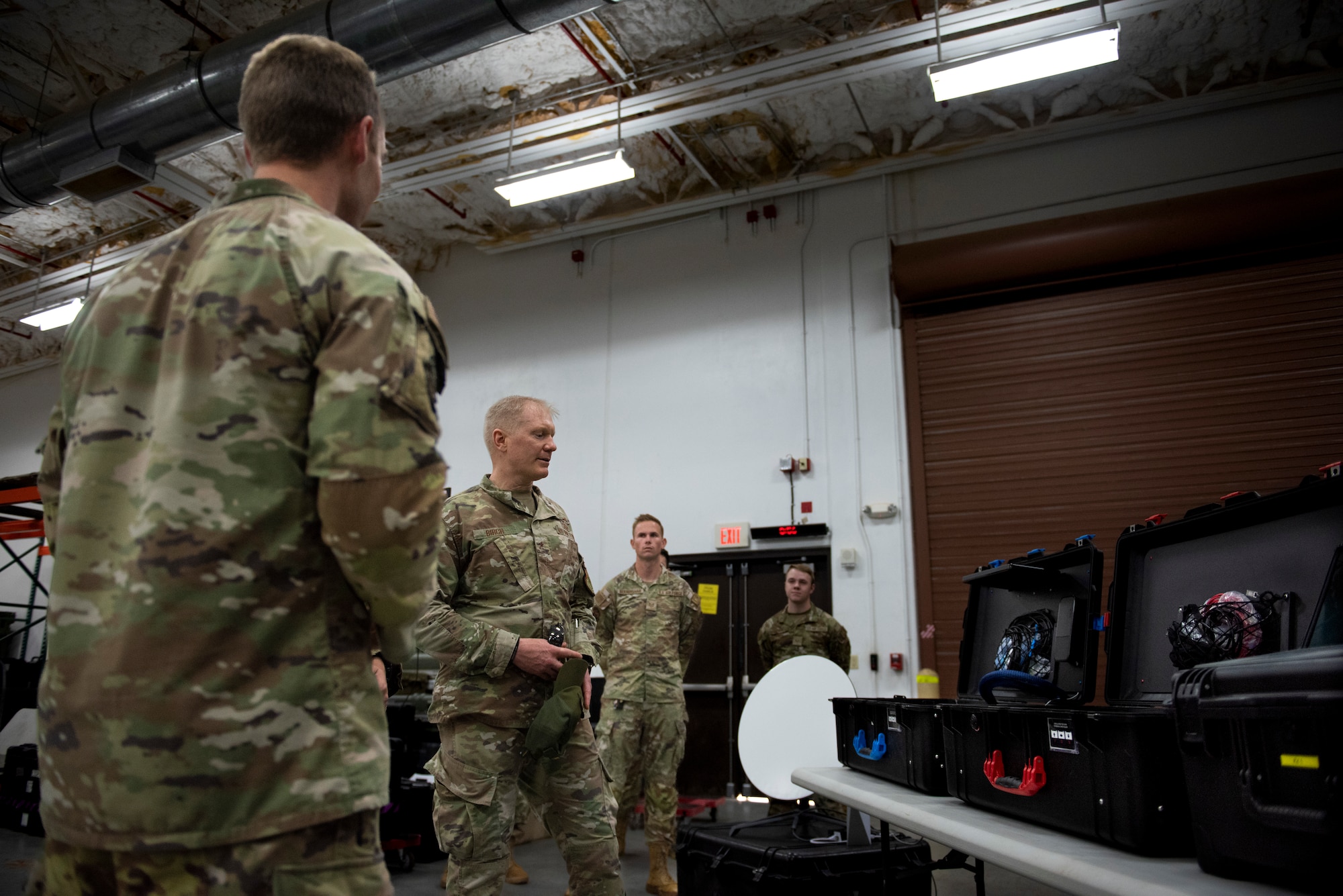 U.S. Air Force Brig. Gen Paul Birch, 36th Wing commander, receives a briefing from members from the 644th Combat Communications Squadron, on Starlink satellites during an immersion tour at Andersen Air Force Base, Guam, June 23, 2022. The 644 CBCS is a rapid-deployment unit designed to deploy all or part of a 32-person team within a moments notice to establish and provide initial non-classified internet protocol router network and secure internet protocol router network services and secure/non-secure voice capabilities. (U.S. Air Force photo by Staff Sgt. Suzie Plotnikov)