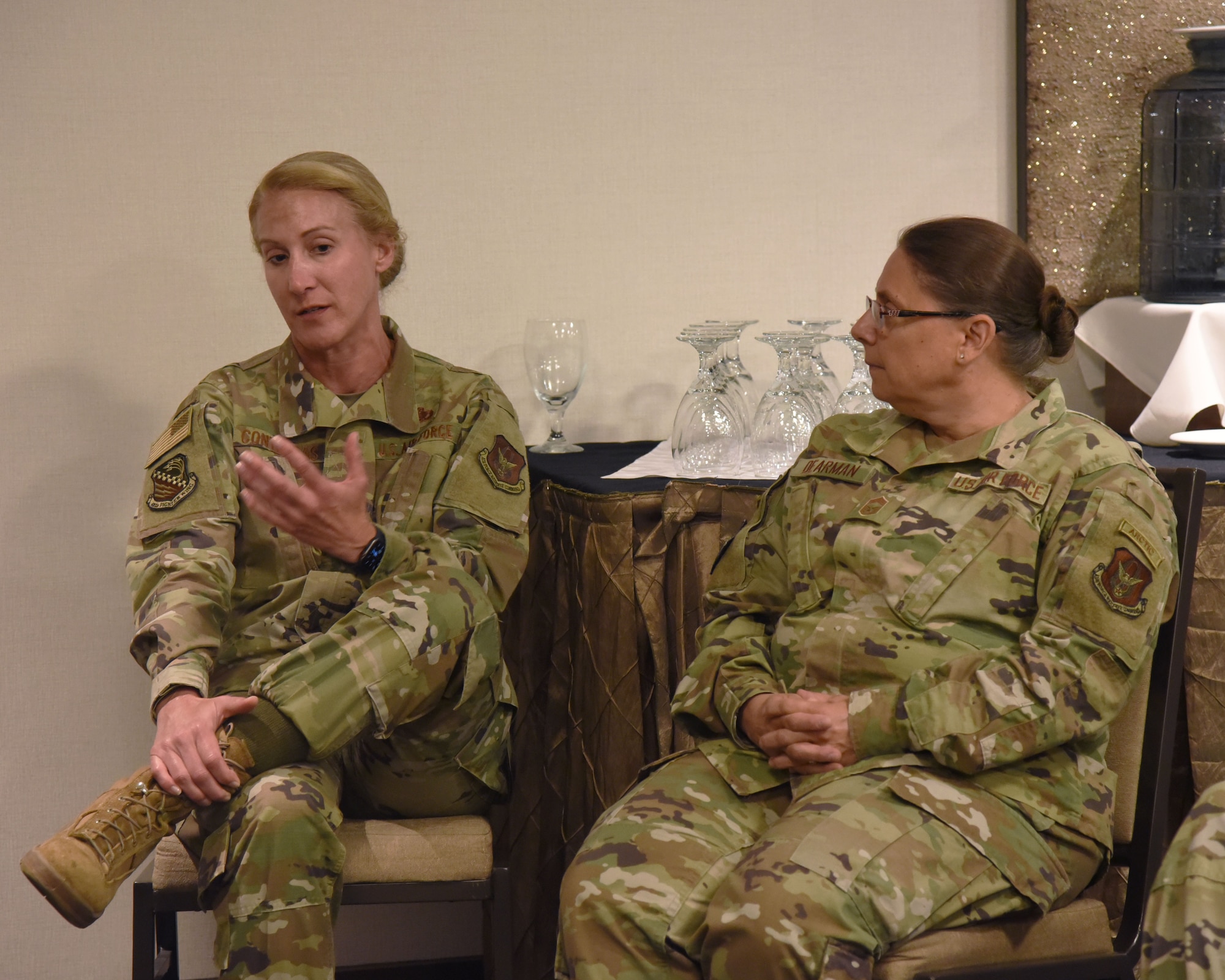 Chief Master Sgt. Mary E. Dearman, right, 477th Fighter Group senior enlisted leader, listens as Chief Master Sgt. Karie A. Contreras, 482nd Fighter Wing senior enlisted leader, discusses unit reform during the Annual Commanders and Command Chiefs management and leadership review event held in Fort Worth, Texas, June 20-23. The three-day session focused on disseminating information from 10th Air Force senior leaders to commanders and chief master sergeants on various topics to include budgeting, recruitment challenges and force restructure. (U.S. Air Force photo by 2nd Lt. Mary A. Andom)