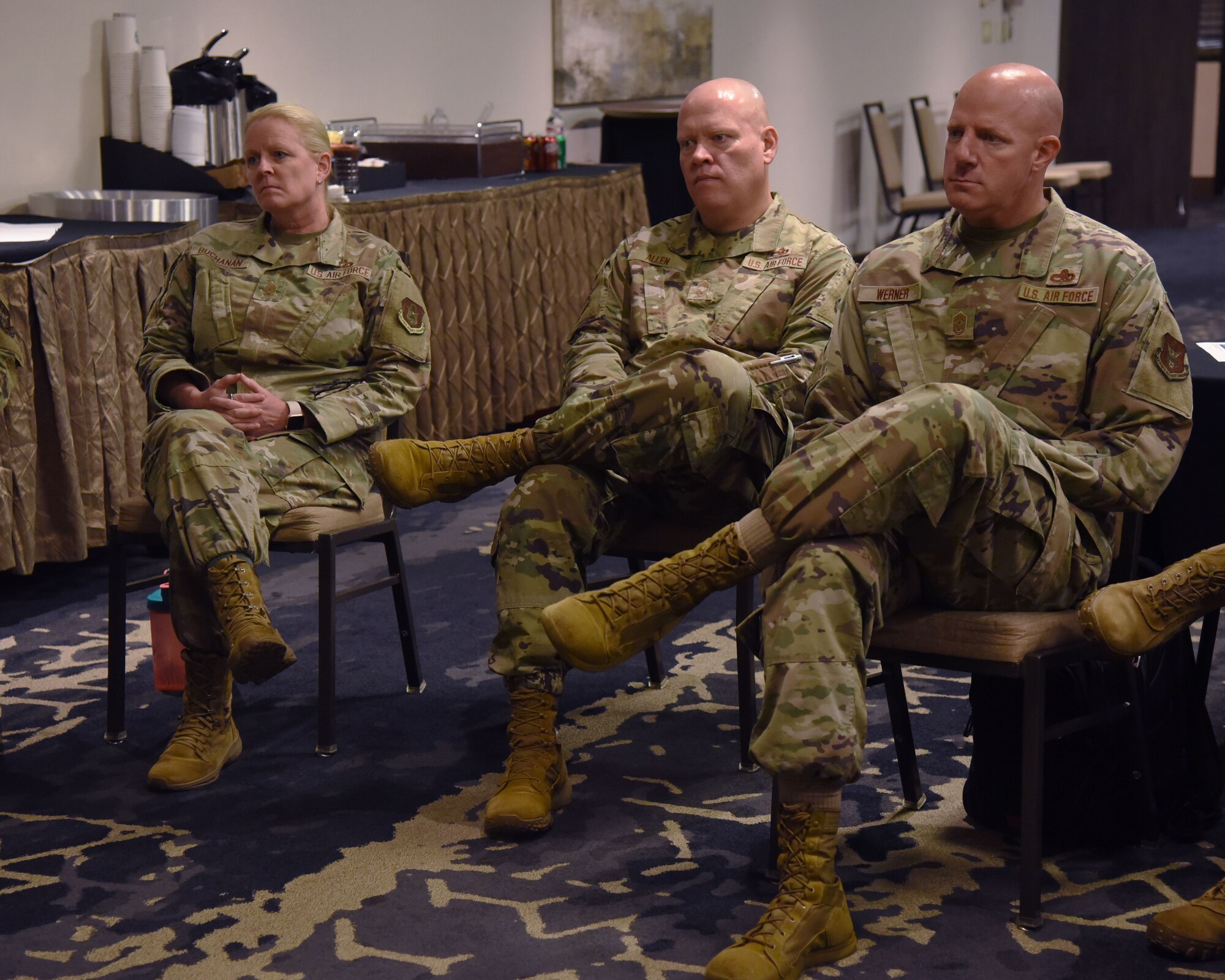 Chief Master Sgt. Catherine E. Buchanan, left, 944th Fighter Wing command chief, Chief Master Sgt. Jeremy Allen, middle, 482nd Fighter Wing command chief, and Chief Master Sergeant Leonard F. Werner III, 307th Bomb Wing command chief, participate in a discussion during the Annual Commanders and Command Chiefs management and leadership review event held in Fort Worth, Texas, June 20-23. The three-day session focused on disseminating information from 10th Air Force senior leaders to commanders and chief master sergeants on various topics to include budgeting, recruitment challenges and force restructure. (U.S. Air Force photo by 2nd Lt. Mary A. Andom)