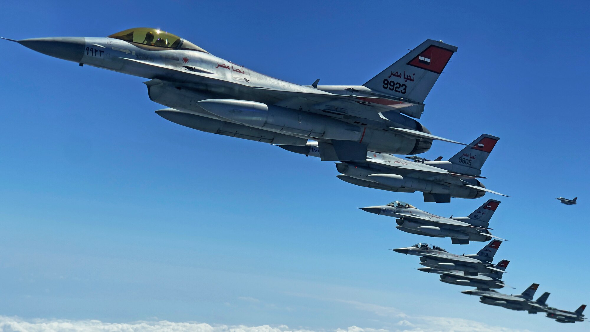 Egyptian Air Force F-16 Fighting Falcons conduct aerial training operations with U.S. Air Force partners in support of exercise Agile Phoenix within the U.S. Air Forces Central area of responsibility June 28, 2022. Agile Phoenix is a joint agile combat employment exercise focused on enhancing interoperability and ensuring regional security. (U.S. Air Force photo by Staff Sgt. Christian Sullivan)