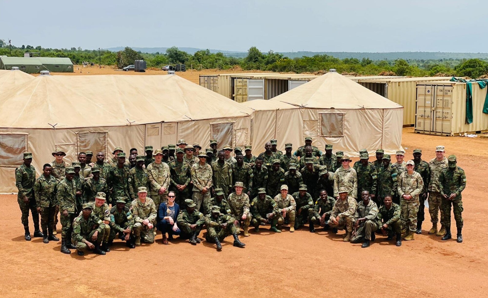 Members of the Nebraska Air National Guard and Rwanda Defence Force pose for a group picture March 20, 2022, during the Justified Accord exercise at Gako Military Academy, Rwanda. The Nebraska Guard and Rwanda are partners under the Department of Defense National Guard Bureau State Partnership Program.