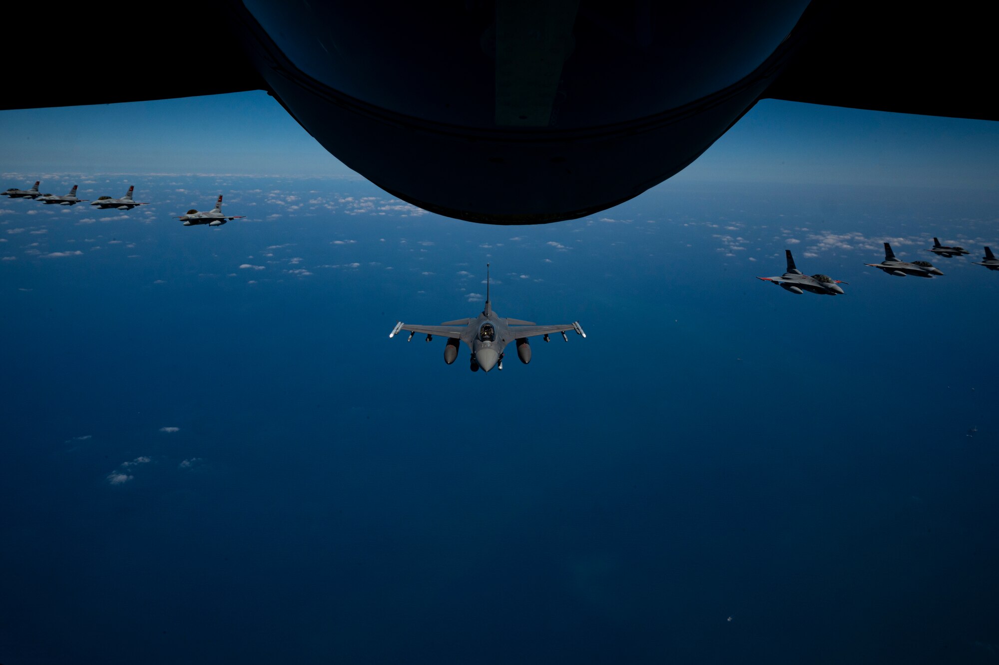 U.S. Air Force and Egyptian Air Force F-16 Fighting Falcons fly in formation during aerial training operations in support of exercise Agile Phoenix within the U.S. Air Forces Central Area of responsibility June 28, 2022. Agile Phoenix is a joint agile combat employment exercise focused on enhancing interoperability and ensuring regional security. (U.S. Air Force photo by Staff Sgt. Christian Sullivan)