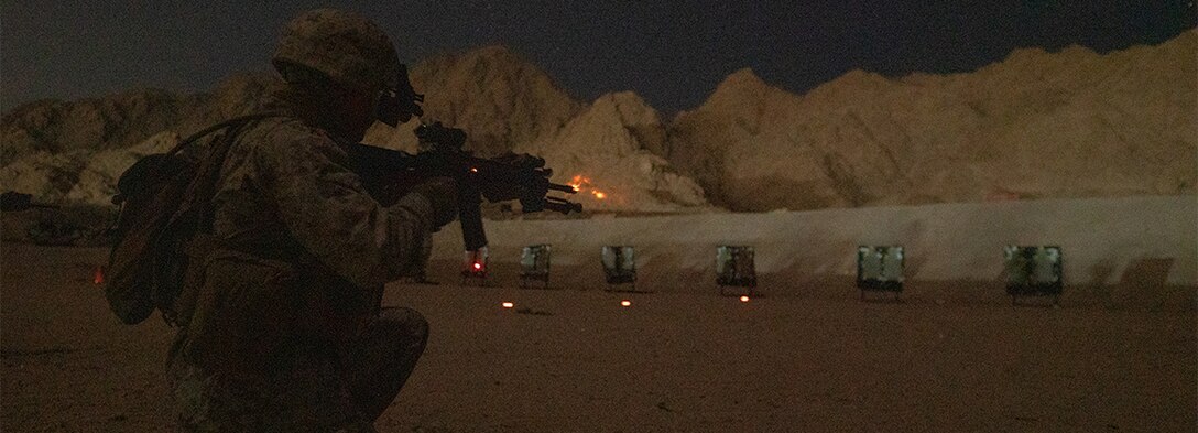 A Marine assigned to 2nd Battalion, 24th Marine Regiment, conduct a night rifle range during exercise Intrepid Maven (IM) 22-1, aboard Camp Titin, Jordan.