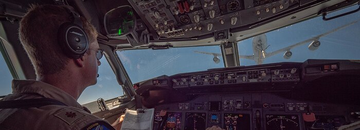 Lt. Cmdr. Daniel Moczygemba, assigned to the "Grey Knights" of Patrol Squadron (VP) 46, deployed with Commander, Task Force (CTF) 57, pilots a P-8A Poseidon maritime patrol aircraft behind a KC-135 Stratotanker, assigned to the 174th Aerial Refueling Squadron, during an Air-to-Air refueling mission.