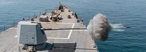 The guided-missile destroyer USS Momsen (DDG 92) participates in a live-fire gun exercise during Iron Defender 2022 in the Arabian Gulf.