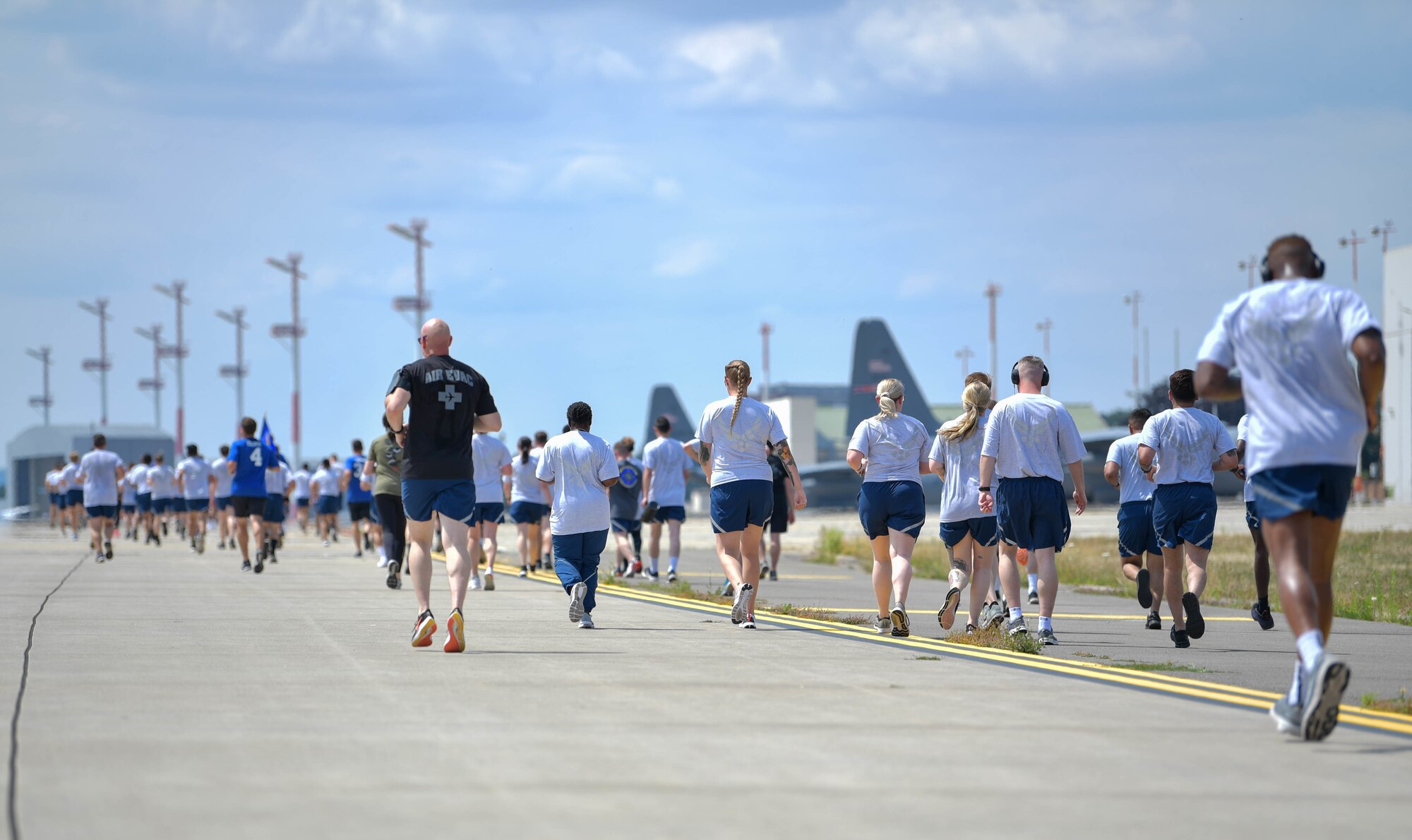 Members of the 86th Airlift Wing participate in a wing run in honor of Ramstein Air Base’s 70th Anniversary at Ramstein Air Base, Germany, June 29, 2022.