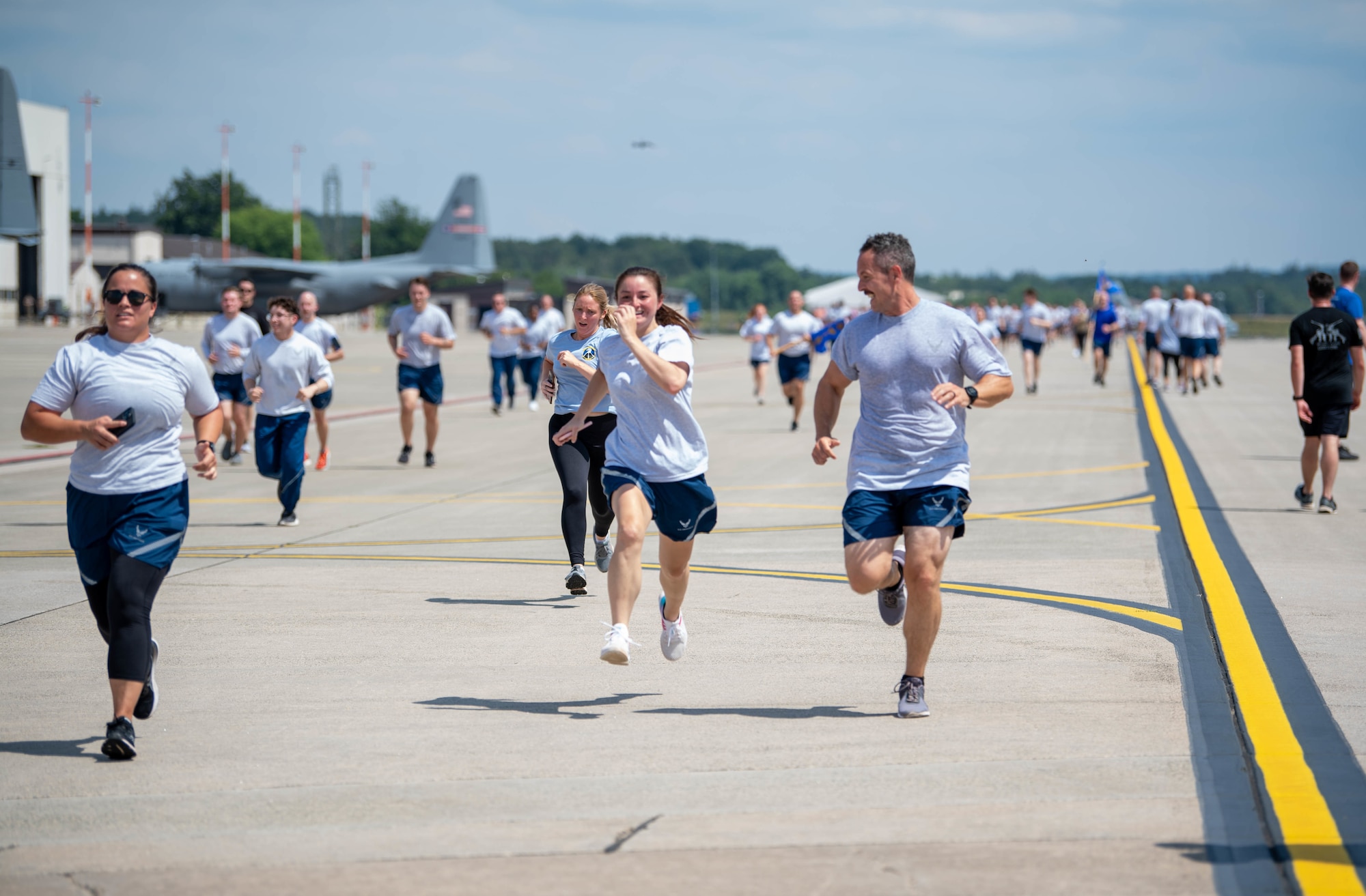 Members of the 86th Airlift Wing celebrate Ramstein Air Base’s 70th Anniversary during a wing run at Ramstein Air Base, Germany, June 29, 2022