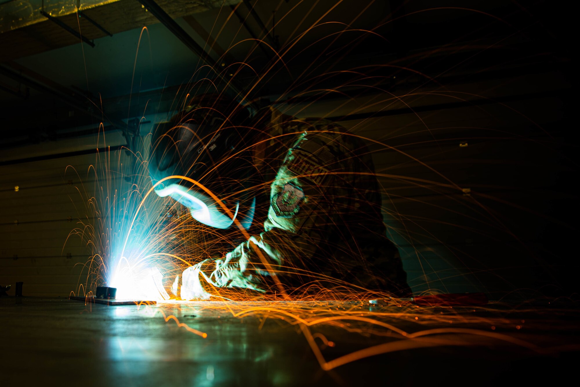 Staff Sgt. Branagan Glennen, 31st Maintenance Squadron metals technician craftsman, cuts a piece of metal using a mill  at Aviano Air Base, Italy, July 6, 2022. The mill is often used to fabricate aircraft parts and locally manufacture tools for different squadrons on Aviano. (U.S. Air Force photo by Senior Airman Noah Sudolcan)