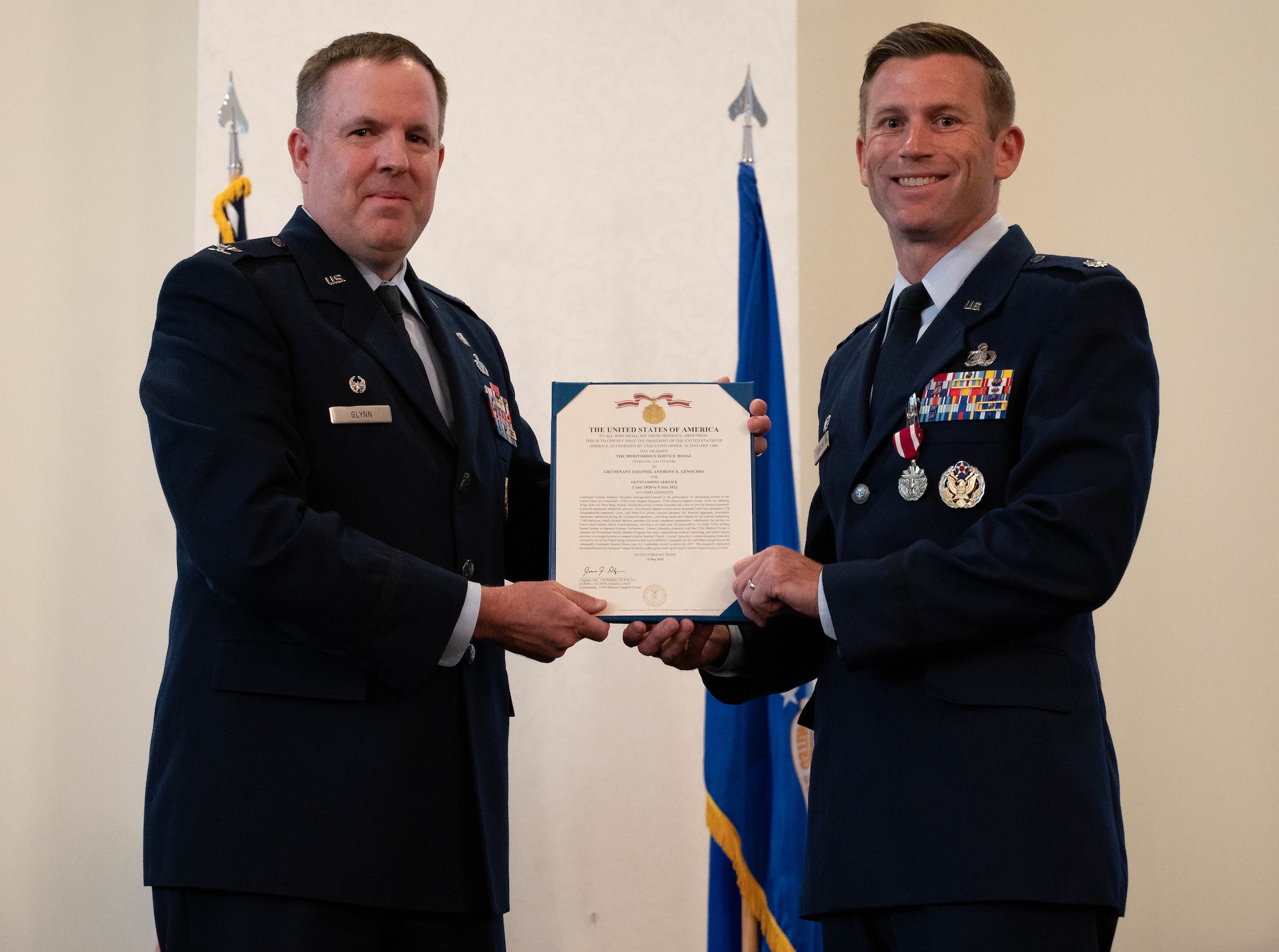 Airmen hold decoration