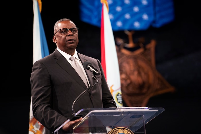Secretary of Defense Lloyd J. Austin III speaks at a ceremony.