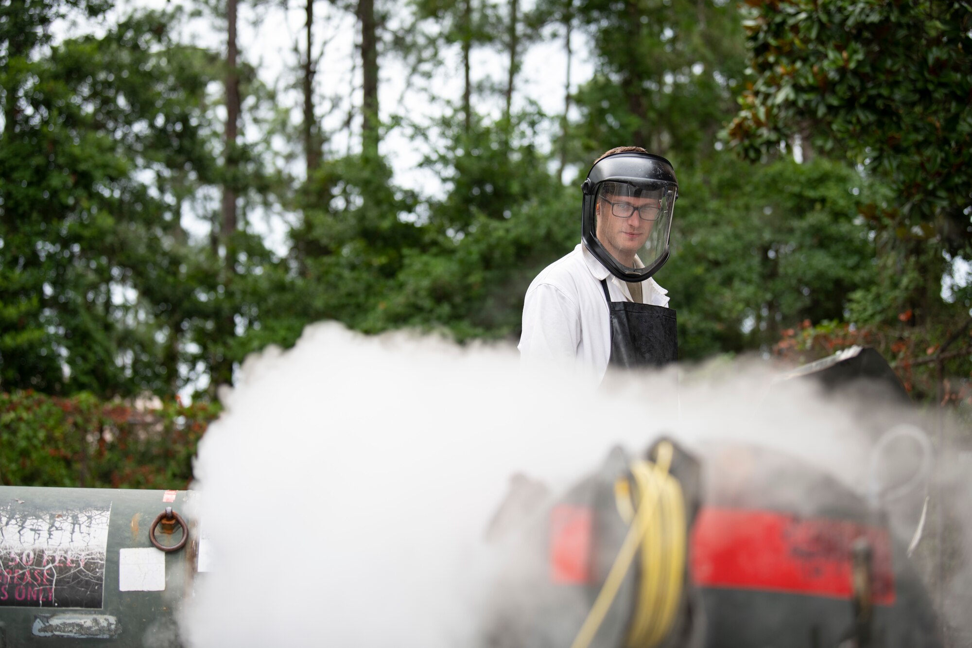 U.S. Air Force Senior Airman Robert Taylor, a 1st Special Operations Logistics Readiness Squadron fuels facilities technician, monitors a liquid oxygen transfer to verify the pressure is stable and no spillage occurs June 15, 2022, at Hurlburt Field, Florida.