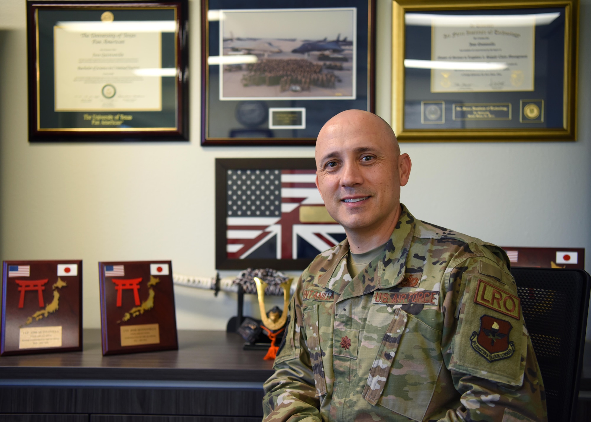 U.S. Air Force Maj. Jose Quintanilla, 17th Logistics Readiness Squadron commander, poses for a portrait in his office at Goodfellow Air Force Base, Texas, June 22, 2022. Quintanilla was stationed at seven previous bases before coming to Goodfellow. (U.S. Air Force photo by Senior Airman Ethan Sherwood)