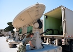 U.S. Air Force Staff Sgt. Rhyan Acey performs maintenance on the AN/TSQ-180 Milstar Communications Vehicle July 30, 2021, at the 233rd Space Group, Greeley Air National Guard Station, Greeley, Colorado. The 233rd Space Group was the first National Guard unit to assume a U.S. Space Command mission. (U.S. Air National Guard photo by Master Sgt. Amanda Geiger)
