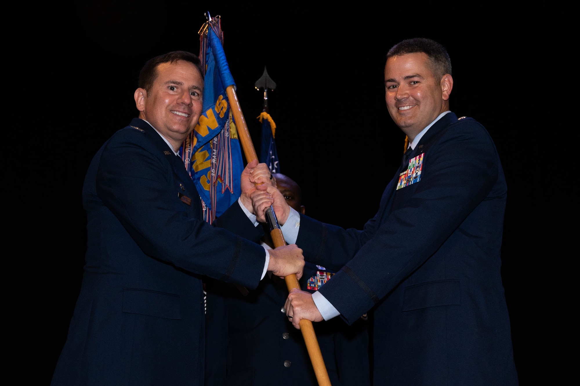 The passing of the guidon during a change of command ceremony.