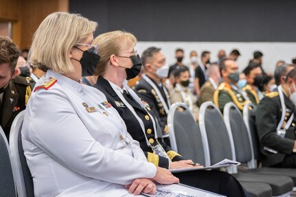 Rear Adm. Sarah Sharkey, the Australian Defense Force (ADF) Joint Health Surgeon, and Rear Adm. Pamela Miller, Command Surgeon for U.S. Indo-Pacific Command, listen to panel discussions during the second Military-Civilian Health Security Summit June 27, 2022, in Singapore. The summit, held June 27-28, focused on regional approaches to global health security through interagency cooperation with allies and partners.