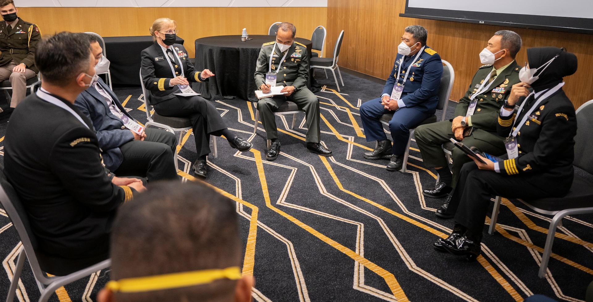 Rear Adm. Pamela Miller, Command Surgeon for U.S. Indo-Pacific Command, speaks with delegates from Indonesia during the second Military-Civilian Health Security Summit June 27, 2022, in Singapore. The summit, held June 27-28, focused on regional approaches to global health security through interagency cooperation with allies and partners.