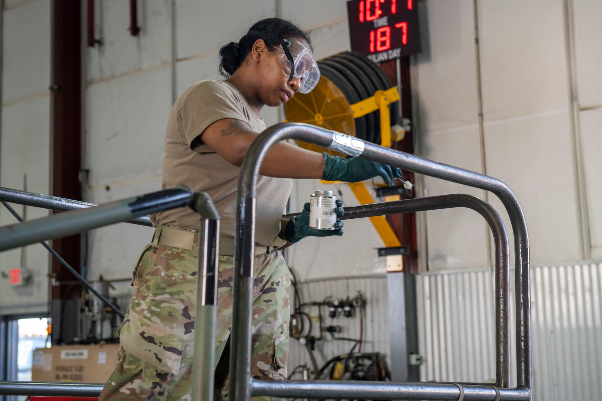 U.S. Air Force Senior Airman Naris Muenrit, 512th Maintenance Squadron aerospace ground equipment technician, conducts routine maintenance on a B1 aircraft maintenance stand at Dover Air Force Base, Delaware, July 6, 2022. In keeping with their squadron’s motto, “Strength in Reserve,” Airmen at the 512th MXS routinely maintain ground equipment to be ready for use with any mission. (U.S. Air Force photo by Senior Airman Ruben Rios)