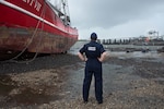 U.S. Coast Guard Chief Petty Officer Joanna Moran, assistant safety officer for the Hurricane Ida Morgan City, Louisiana Incident Command Post, identifies potential safety hazards in Port Fourchon, Louisiana, Sept. 14, 2021. The U.S. Coast Guard is working with interagency partners to identify and clear displaced vessels and hazards to navigation impacting vessel traffic in federal waterways. (U.S. Coast Guard photo by Petty Officer 3rd Class Vincent Moreno)