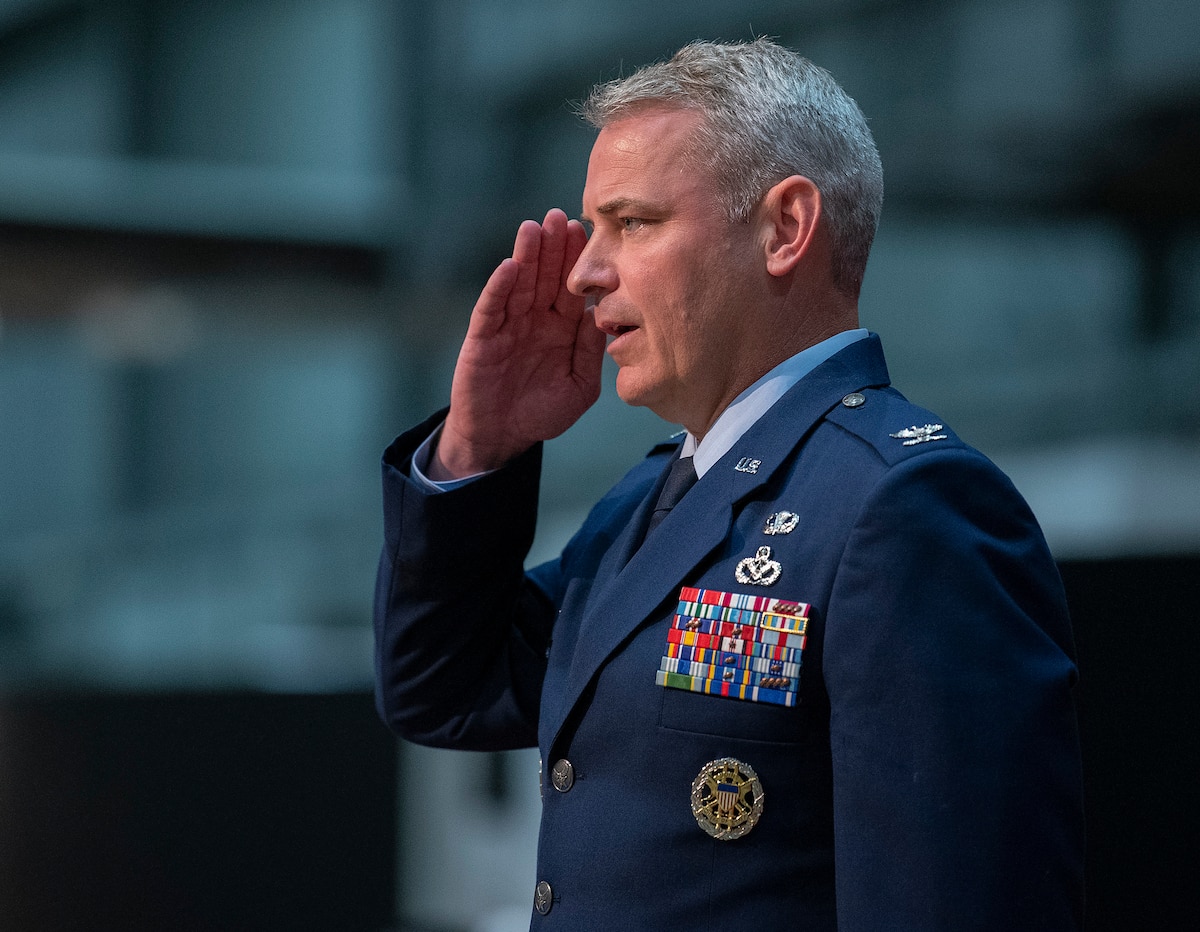 Col. Christopher Meeker returns his first salute as 88th Air Base Wing and installation commander during a change of command ceremony July 7, 2022, inside the National Museum of the U.S. Air Force at Wright-Patterson Air Force Base, Ohio. Meeker assumed command from Col. Patrick Miller, who had served in the position for two years. (U.S. Air Force photo by R.J. Oriez)