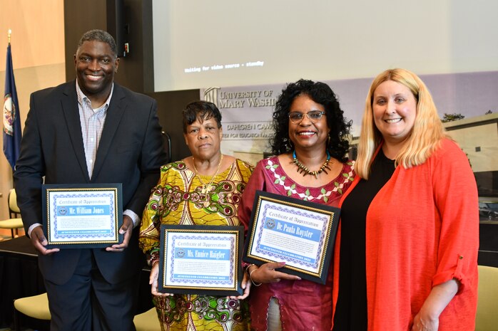 IMAGE: From left to right, William Jones, Virginia Black History Month Association president; Eunice Haigler, Color of History Coalition president; Dr. Paula Royster, Center for African American Genealogical Research, Inc. president and CEO; show Certificates of Appreciation that were presented by Terri Gray, Naval Surface Warfare Center Dahlgren Division (NSWCDD) chief of staff; at NSWCDD’s commemoration of Juneteenth 2022 at the University of Mary Washington Dahlgren Campus, June 30.