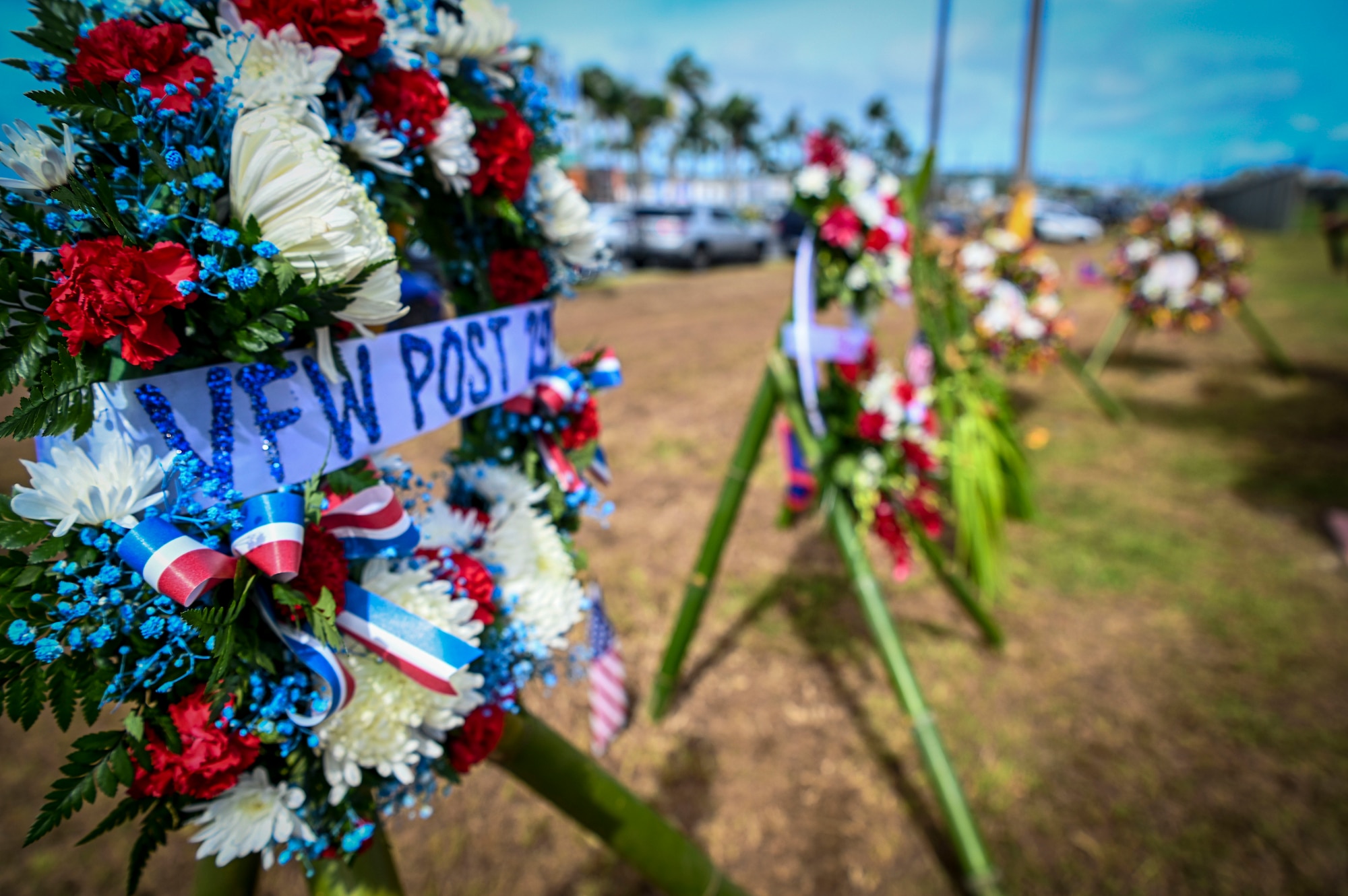 Wreaths are displayed during the Hasso Monmong-Toto-Maite Marine Depot Memorial Ceremony in Maite, Guam on July 7, 2022.