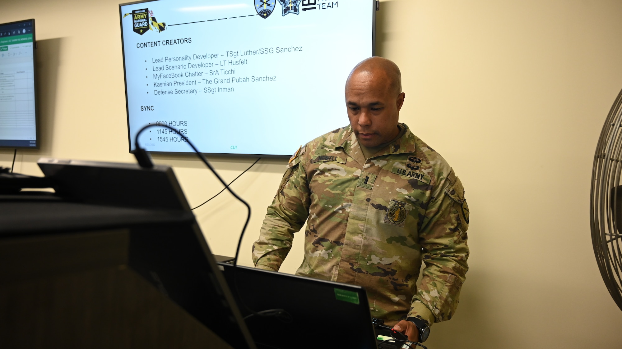 U.S. Army 1st Lt. Clarence Nowell, mission element lead for the 169th Cyber Protection Team, Maryland Army National Guard prepares his workstation before the start of Cyber Blitz 22-3 at Warfield Air National Guard Base, Middle River, Maryland on March 23, 2022.
