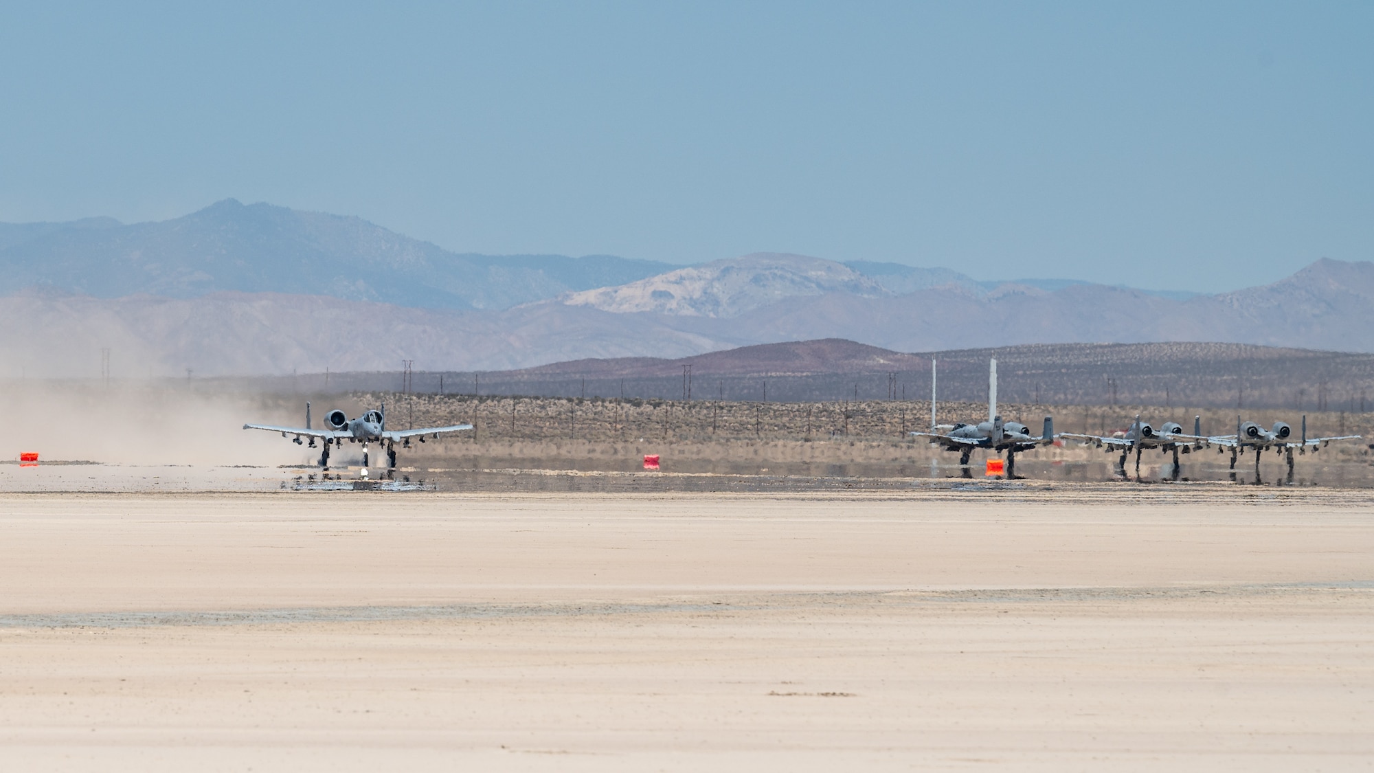 An A-10 Thunderbolt II, assigned to the 355th Wing, out of Davis-Monthan Air Force Base, Arizona, takes off from Rogers Dry Lake during an Agile Combat Employment Exercise on Edwards Air Force Base, California, June 27. The training featured Airmen from the 821st Contingency Response Squadron, out of Travis Air Force Base, California, and the 412th Operations Support Squadron based at Edwards AFB. (Air Force photo by Giancarlo Casem)