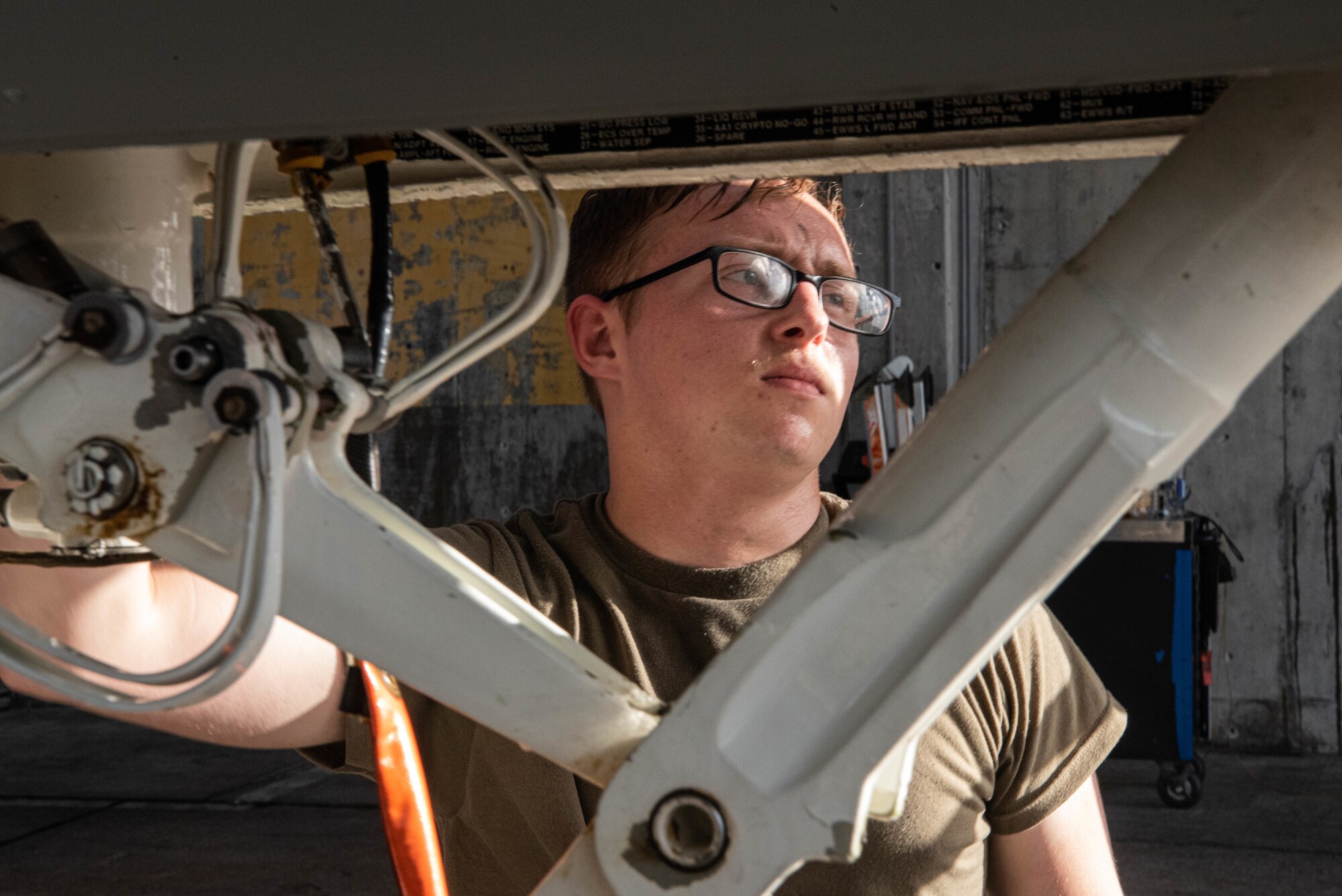 An Airman from the 44th AMU inspects the ASP on an F-15C Eagle.