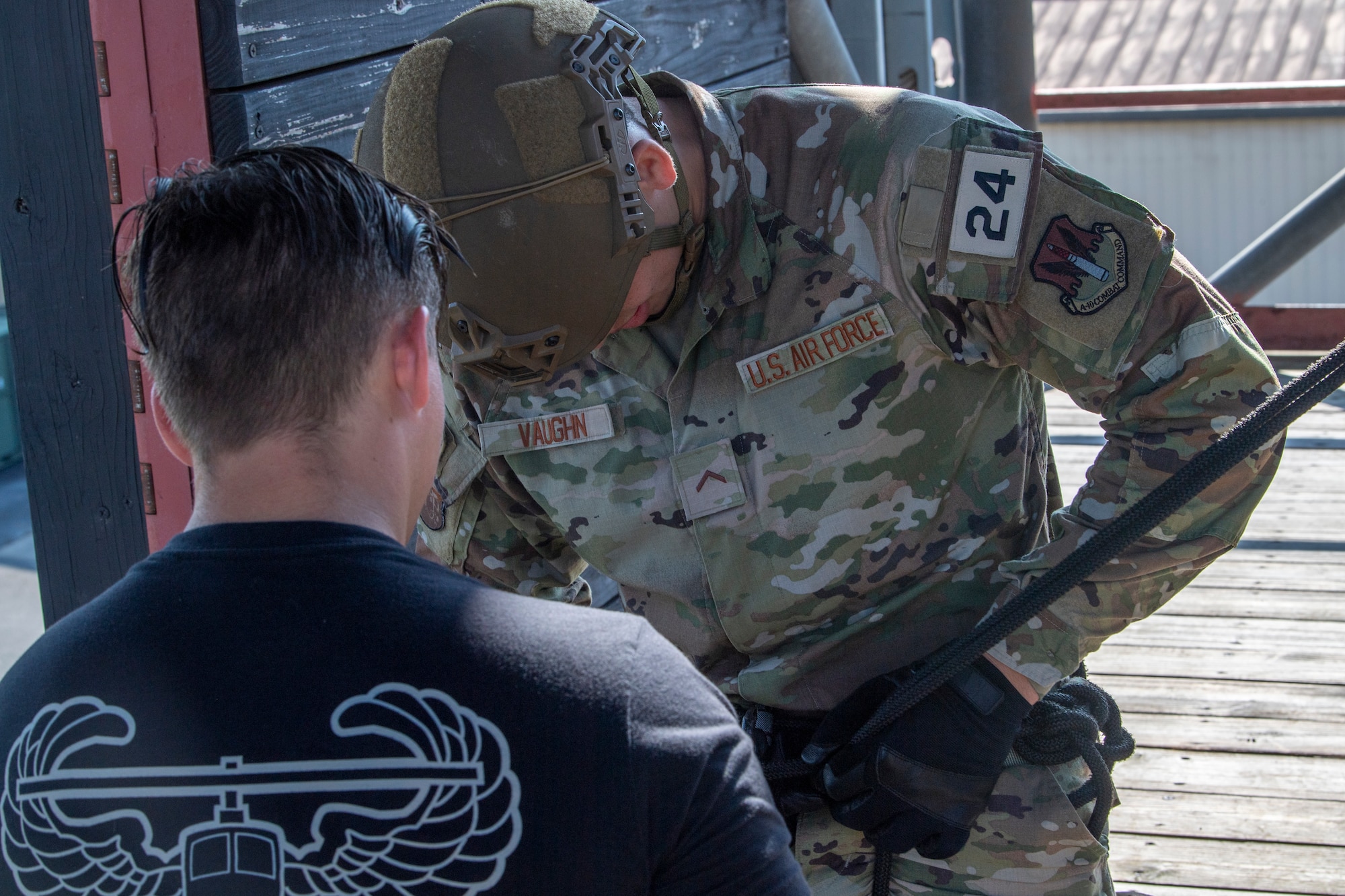 U.S. Air Force Staff Sgt. Tyler Gavorcik, 820th Combat Operations Squadron advanced skills noncommissioned officer in charge, prepares a U.S. Air Force Academy cadet to rappel at Moody Air Force Base, Georgia, June 29, 2022.