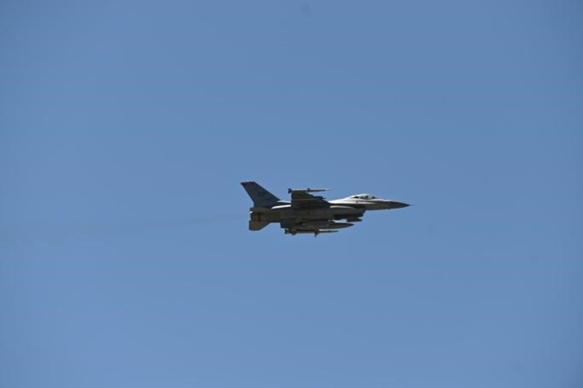 A U.S. Air Force F-16 Fighting Falcon aircraft assigned to the 480th Fighter Squadron, from Spangdahlem Air Base, Germany, flies during Exercise Real Thaw 22 on Beja Air Base, Portugal, June 27, 2022. Real Thaw is a multinational training exercise held by the Portuguese air force. The priority of this exercise is to maintain ready and postured forces prepared to support combatant commander objectives. (U.S. Air Force photo by Tech. Sgt. Warren D. Spearman Jr.)