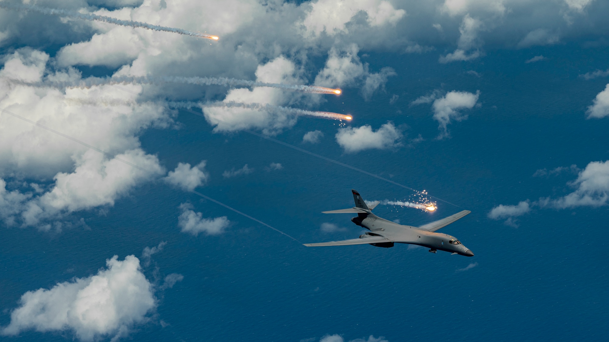 A U.S. Air Force B-1B Lancer, assigned to 34th Expeditionary Bomb Squadron, deploys flares during a Bomber Task Force mission over the Pacific Ocean, June 25, 2022.