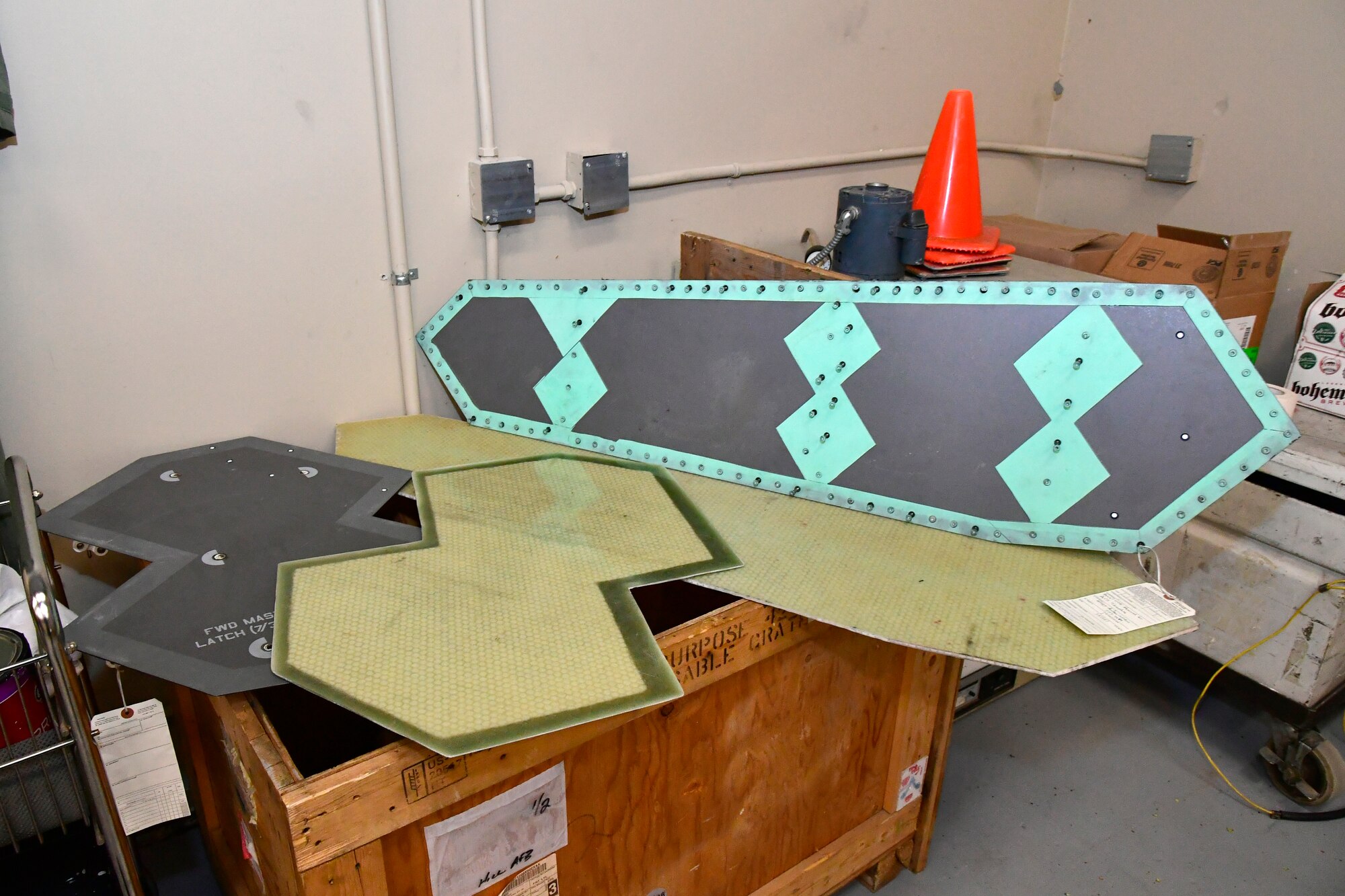 Fabricated F-35 replacement panels made by the Air Force Life Cycle Management Center advanced composite office, ready for installation May 4, 2022, at Hill Air Force Base, Utah. The panels will be used in place of those that were damaged or missing on a salvage F-35B cockpit section being turned into a sectional training aids by the 372nd Training Squadron, Det. 3, for use during instruction of F-35 maintainers. (U.S. Air Force photo by Todd Cromar)