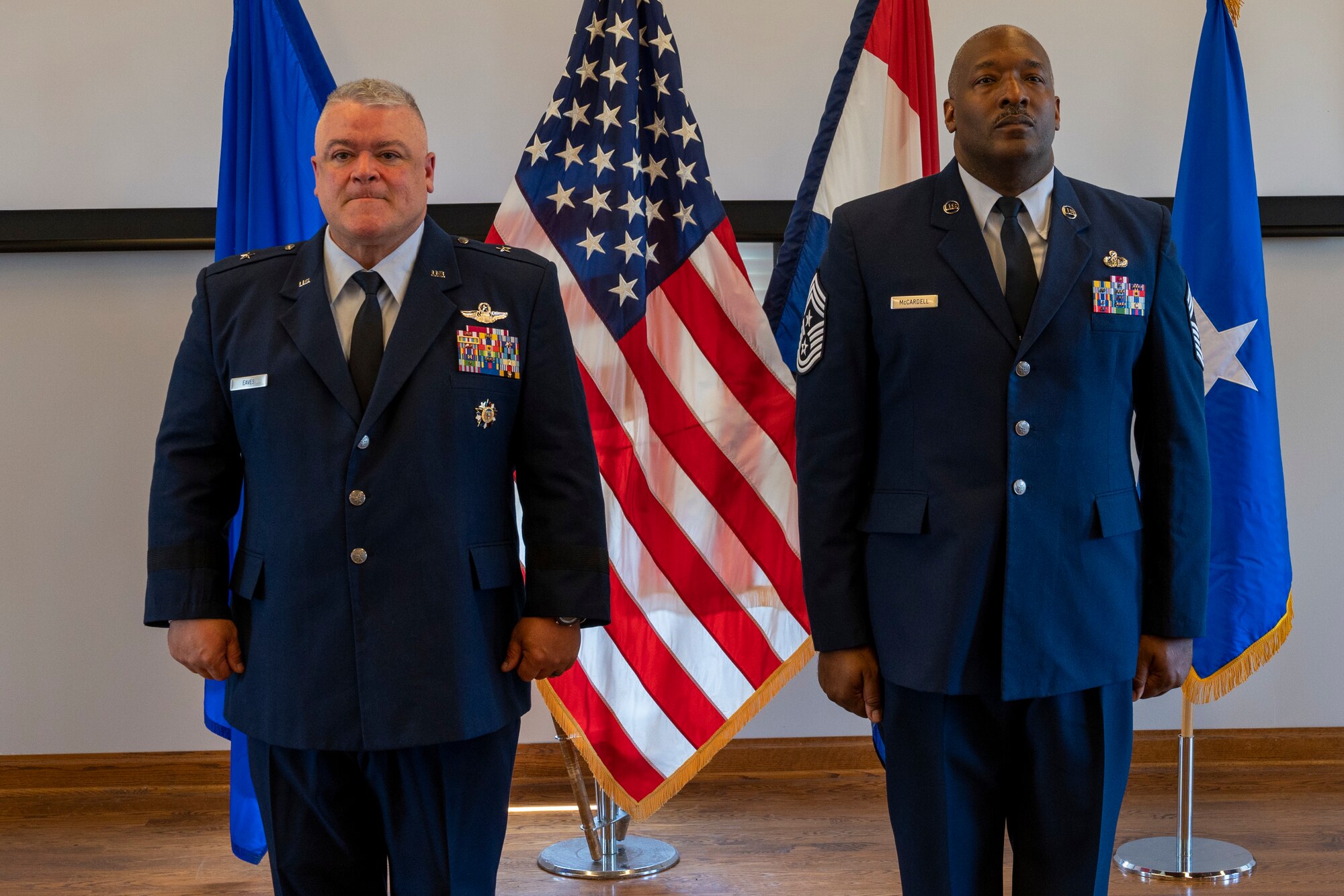 Chief Master Sgt. LeRoy E. McCardell Jr., right, 131st Bomb Wing Command Chief Master Sergeant, stands with Brig. Gen. Kenneth S. Eaves, Assistant Adjutant General- Air, Missouri National Guard, during his retirement ceremony, June 25, 2022, at Jefferson Barracks Air National Guard Base, St. Louis, Missouri. McCardell served for 34 years. (U.S. Air National Guard photo by Senior Airman Whitney Erhart)