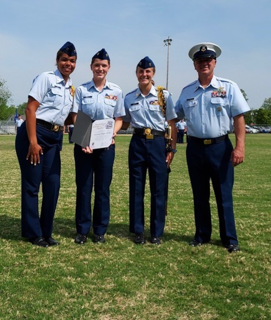 Two graduating Coast Guard Junior Reserve Officers’ Training Corps (JROTC) cadets from Camden High School in Camden, N.C., receive appointments to the Coast Guard Academy and one to the CGA Scholars Program, May 6. (USCG photo by Lucille Vogel, U.S. Coast Guard Auxiliary.)