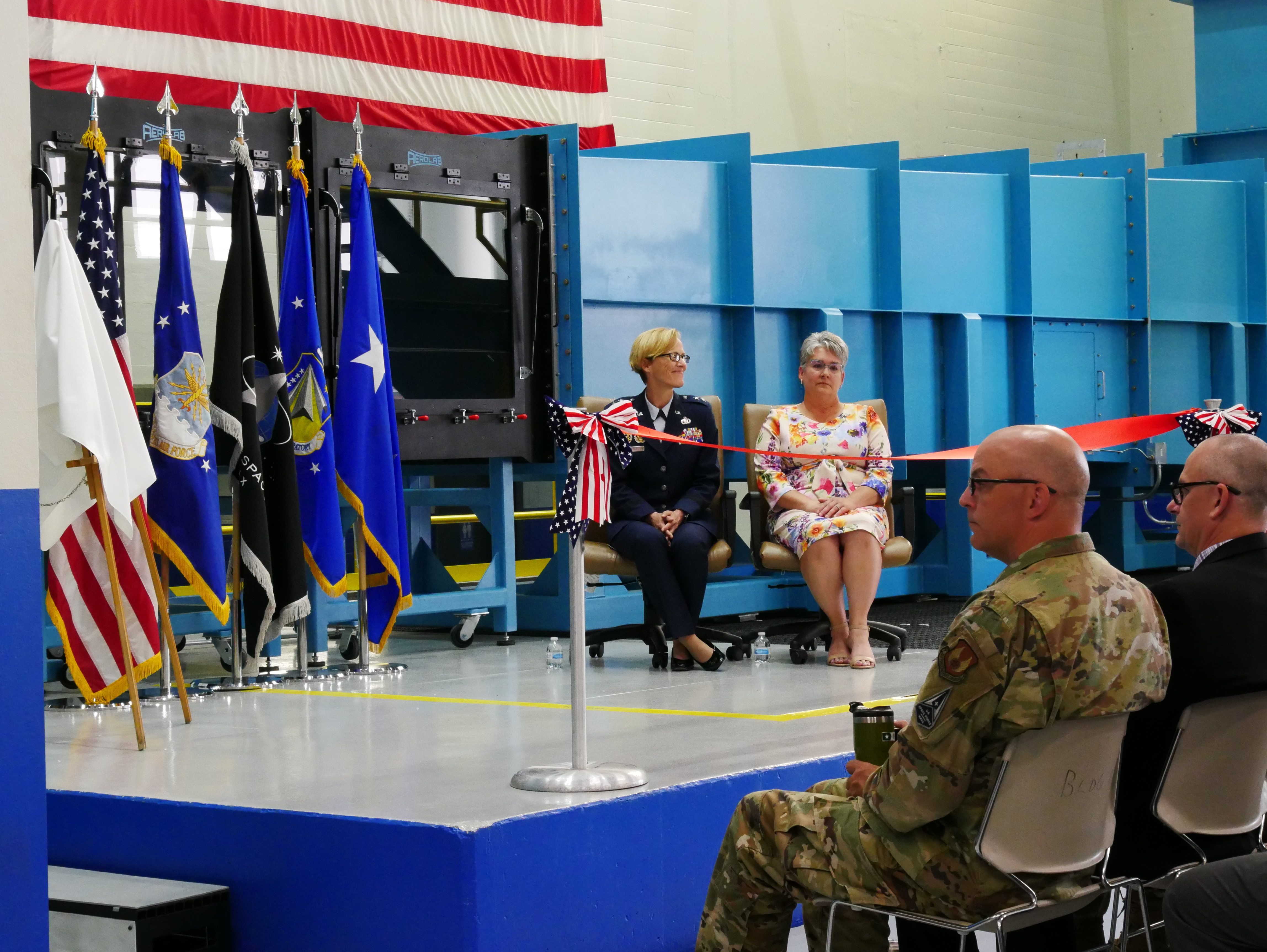 Air Force Research Laboratory Commander Maj. Gen. Heather Pringle and Davilyn Parker, wife of AFRL Aerospace Engineer Dr. Greg Parker, attend a ribbon-cutting and dedication ceremony for the lab’s newest wind tunnel, the Parker Subsonic Research Facility, or SuRF, at Wright-Patterson Air Force Base, Ohio, July 7, 2022. The facility is named after Dr. Greg Parker, a beloved member of AFRL's Aerospace Systems Directorate, who died after a long battle with cancer. SuRF is a low-speed wind tunnel used to evaluate prototype models including 3D-printed components that allows engineers to validate new aircraft designs. (U.S. Air Force photo / Kenneth McNulty)