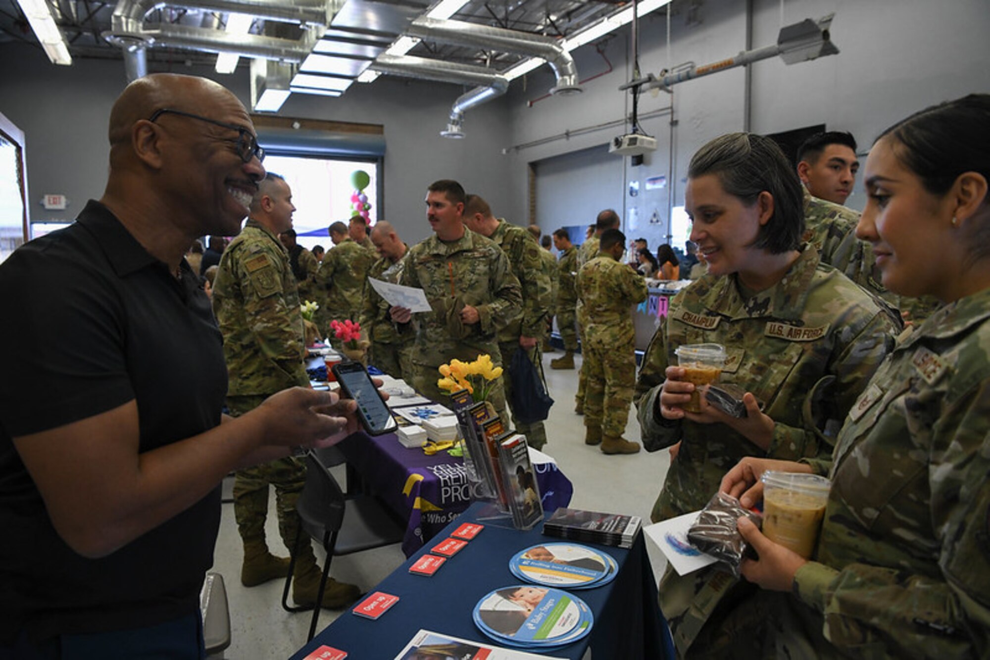 U.S. Air Force Reserve Citizen Airmen attend the Spring Into Wellness Information Fair in the Heat Seeker room, on Luke Air Force Base, Arizona on May 15, 2022. Airmen were provided resources for mental health and self care to look out for themselves and wingmen. (U.S. Air Force Photo by Senior Airman Alexis Orozco)