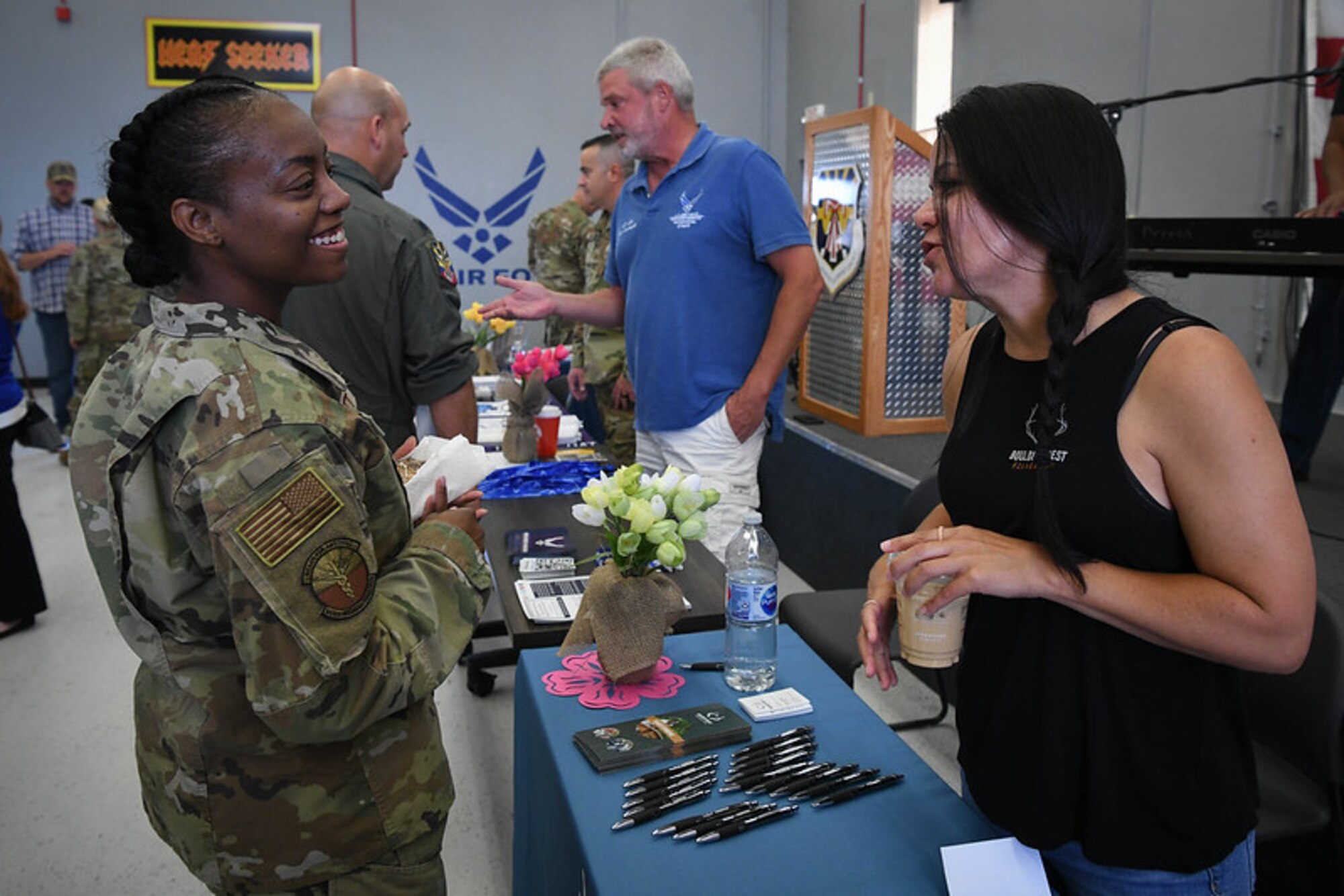 U.S. Air Force Reserve Citizen Airmen attend the Spring Into Wellness Information Fair in the Heat Seeker room, on Luke Air Force Base, Arizona on May 15, 2022. Airmen were provided resources for mental health and self care to look out for themselves and wingmen. (U.S. Air Force Photo by Senior Airman Alexis Orozco)